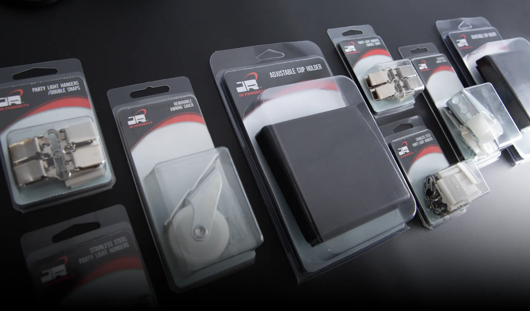 JR Products packaged multi-purpose accessories displayed as a retail assortment